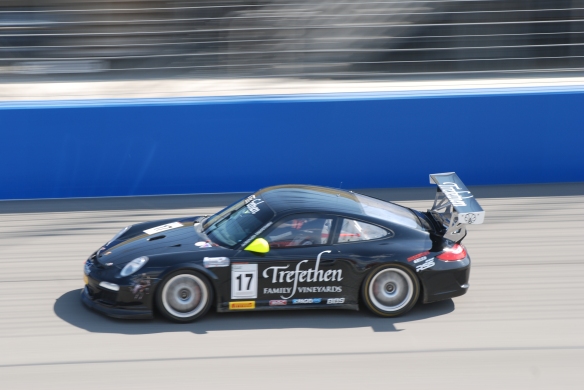 Pirelli GT3 Cup races_ GT3 cup cars / black with chartrues  green mirrors , #17 Trefethen Porsche, pan shot_California Festival of Speed_4/5/14